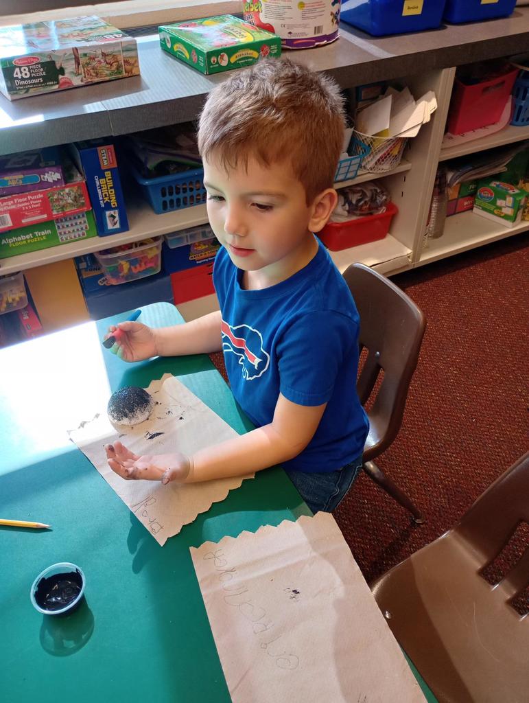 Kindergarteners making spiders!