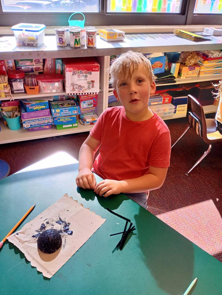 Kindergarteners making spiders!