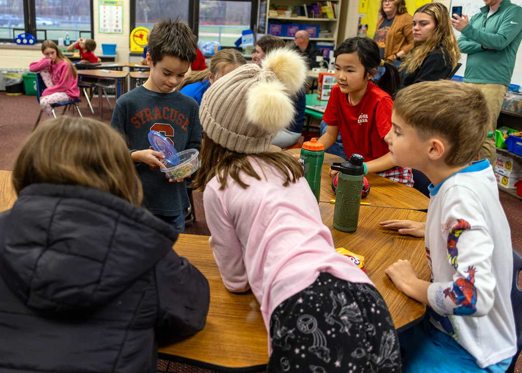 Hudson presents to the class about Willy the Wooly Bear Caterpillar