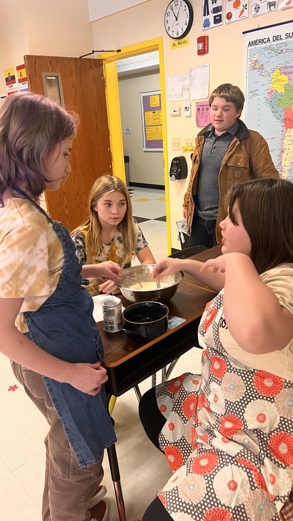 6th grade cooking class makes waffles