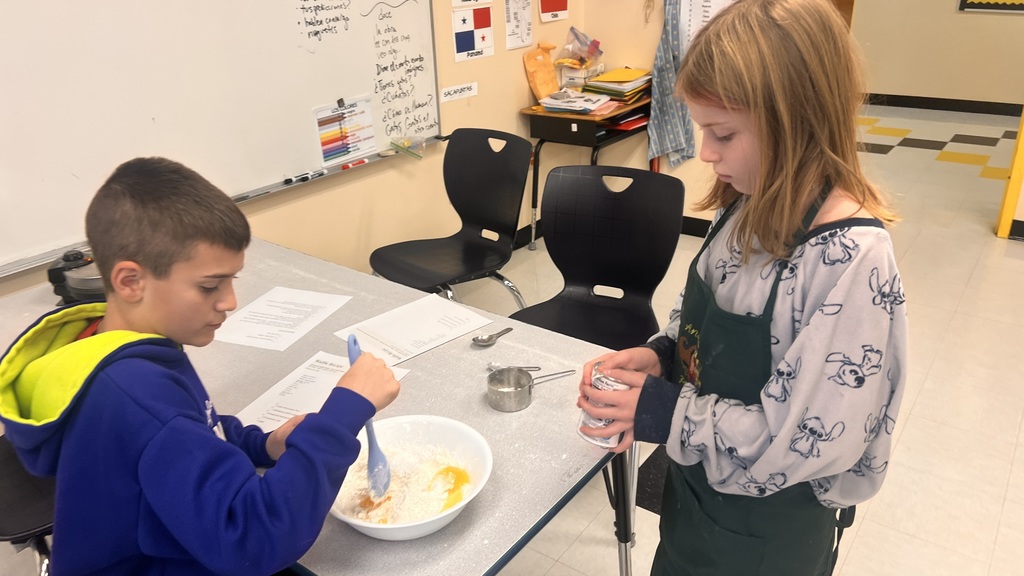 6th grade cooking class makes waffles