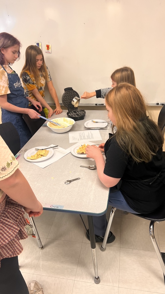 6th grade cooking class makes waffles