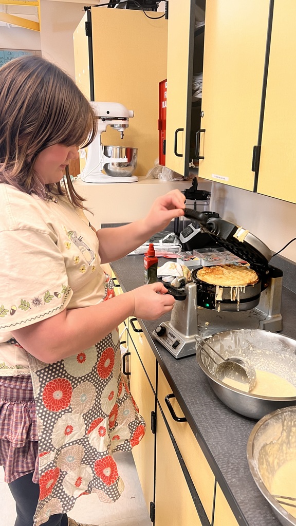 6th grade cooking class makes waffles