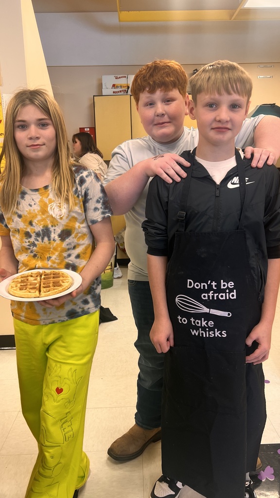 6th grade cooking class makes waffles