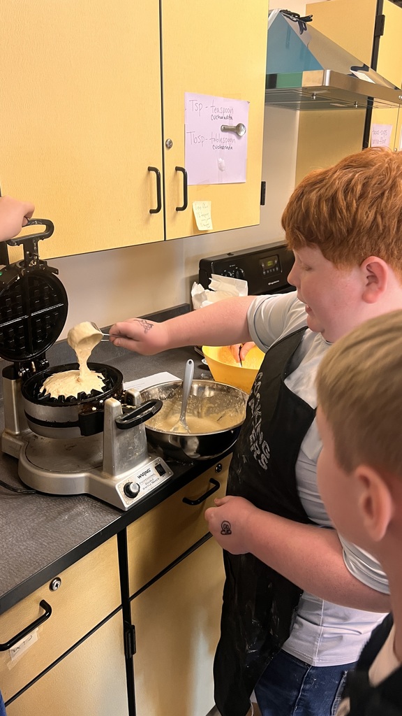 6th grade cooking class makes waffles