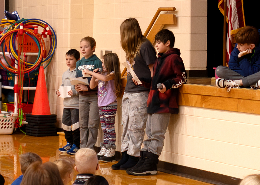 Morning program photo of students telling jokes