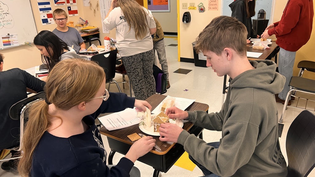 Spanish class makes Gingerbread Houses