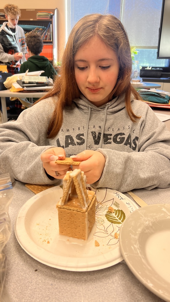 Spanish class makes Gingerbread Houses