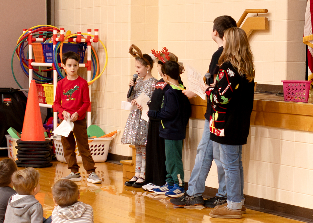 Morning program December 19th students telling jokes