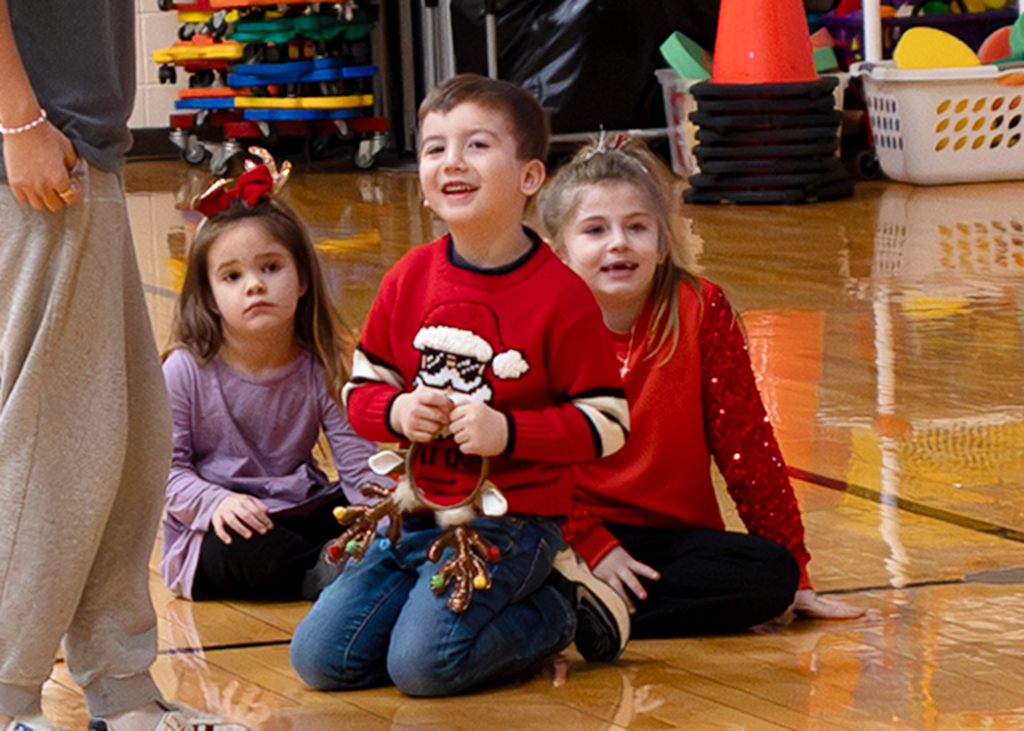Morning program December 19th students smiling