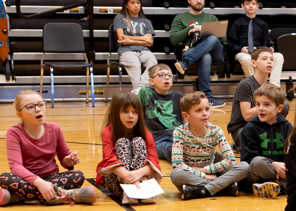Morning program December 19th students singing