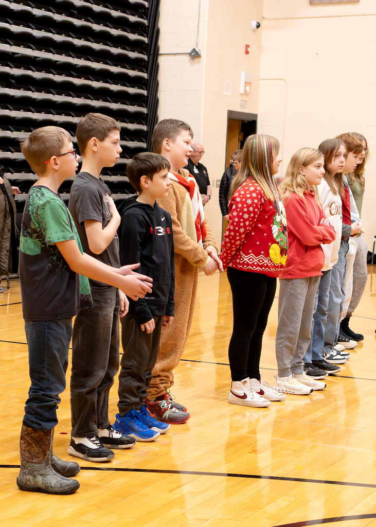 Morning program December 19th students saying the pledge