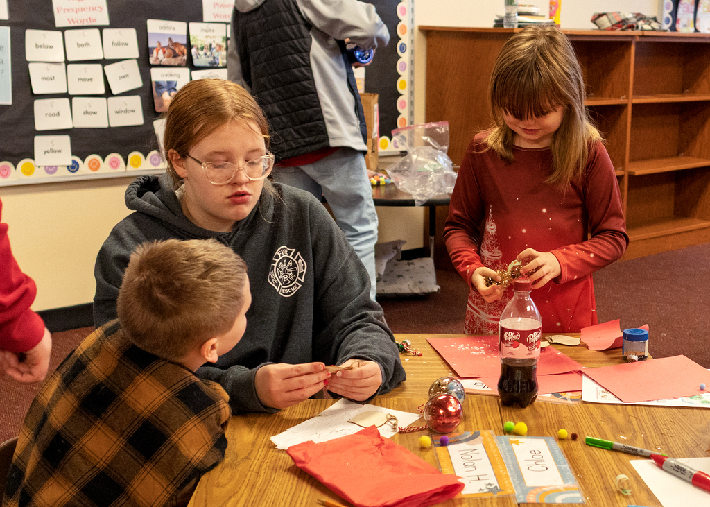 OV students pair up to make ornaments