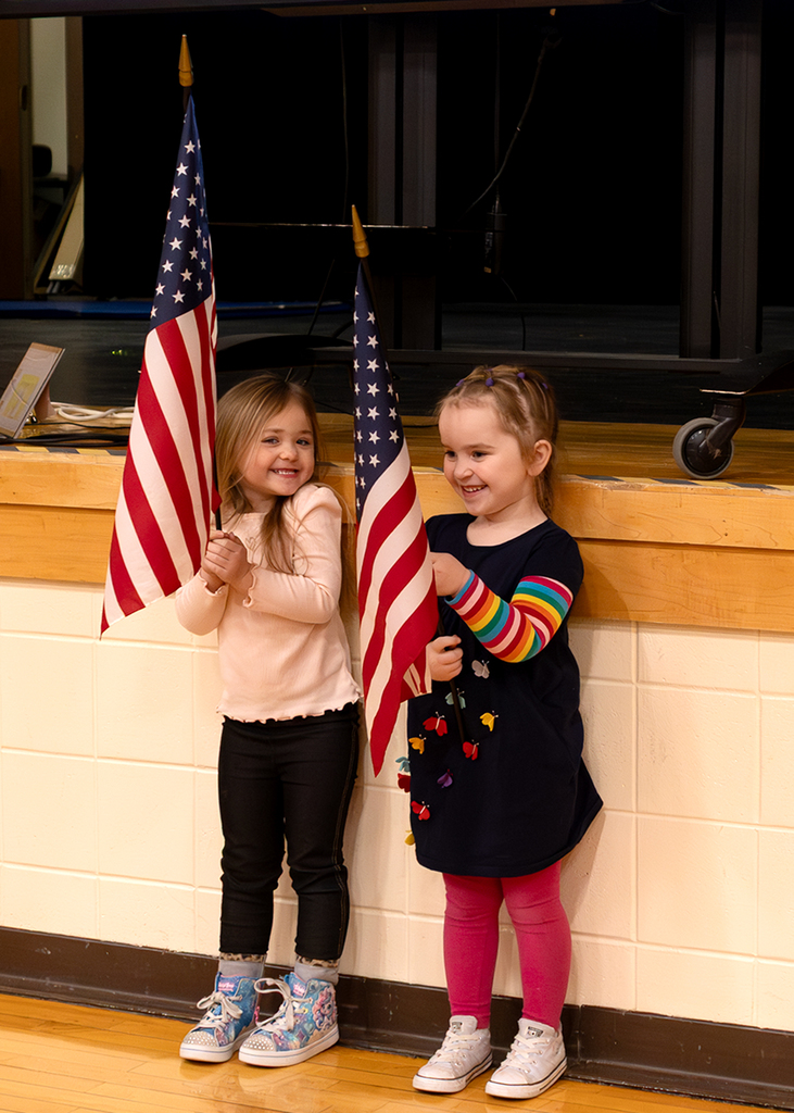 Students holding the flags