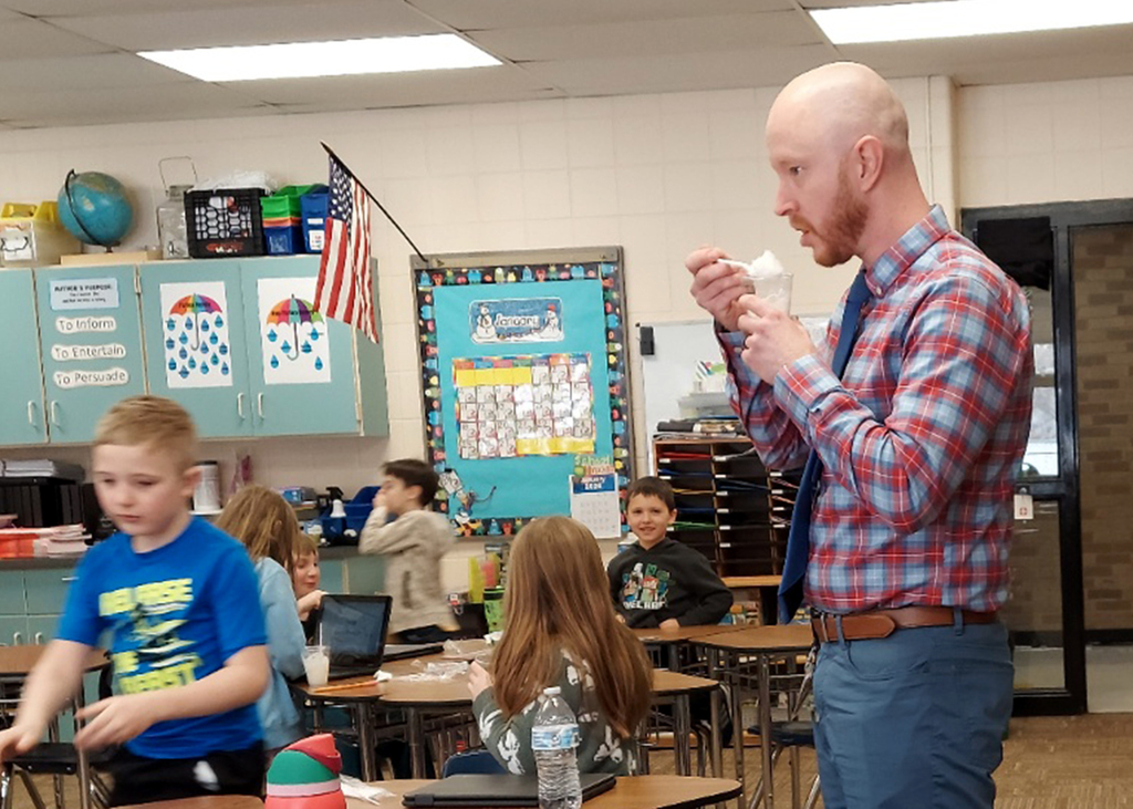 Mr. Wentworth enjoys the snow ice cream