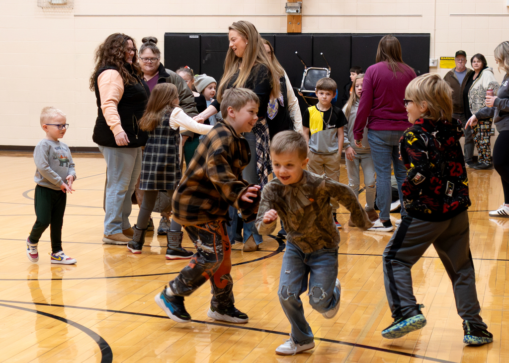 Students dance at the end of the morning program