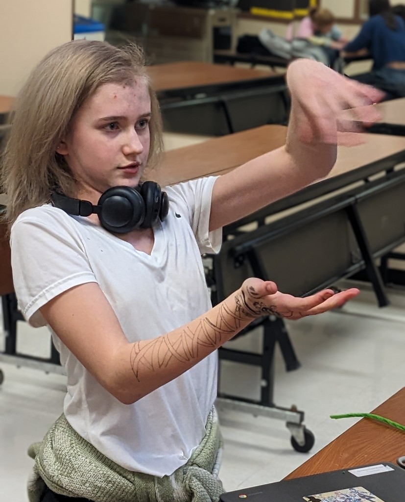 An OV student talking to a mentor