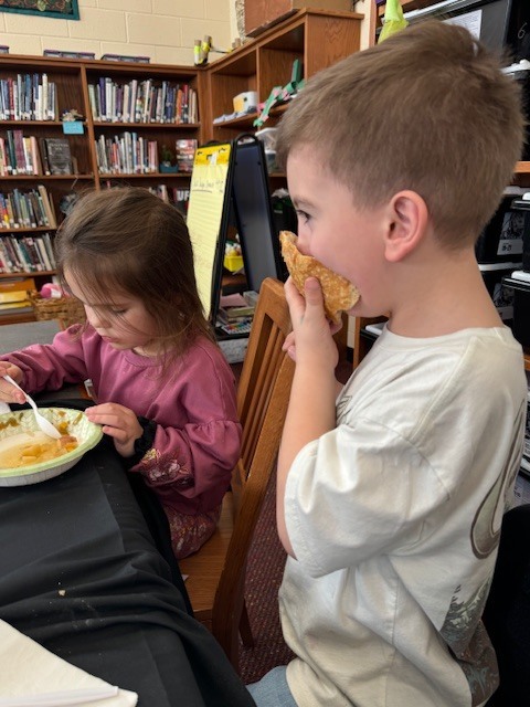 A student tries the bread