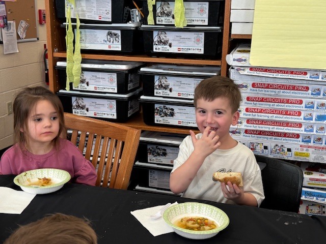 Students eating the soup