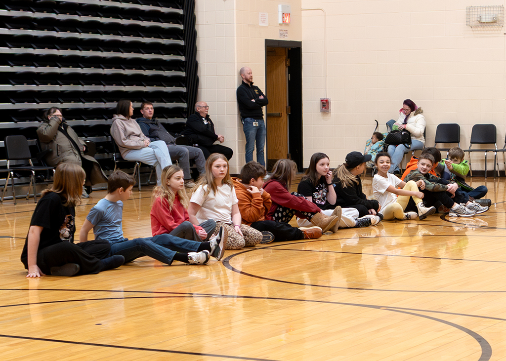 Students waiting for the program to start