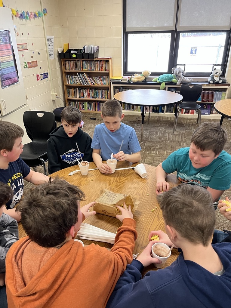 Students enjoying hot chocolate and popcorn
