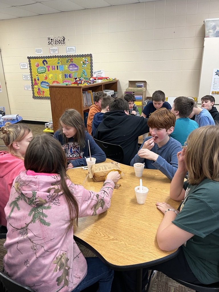 Students enjoying hot chocolate and popcorn