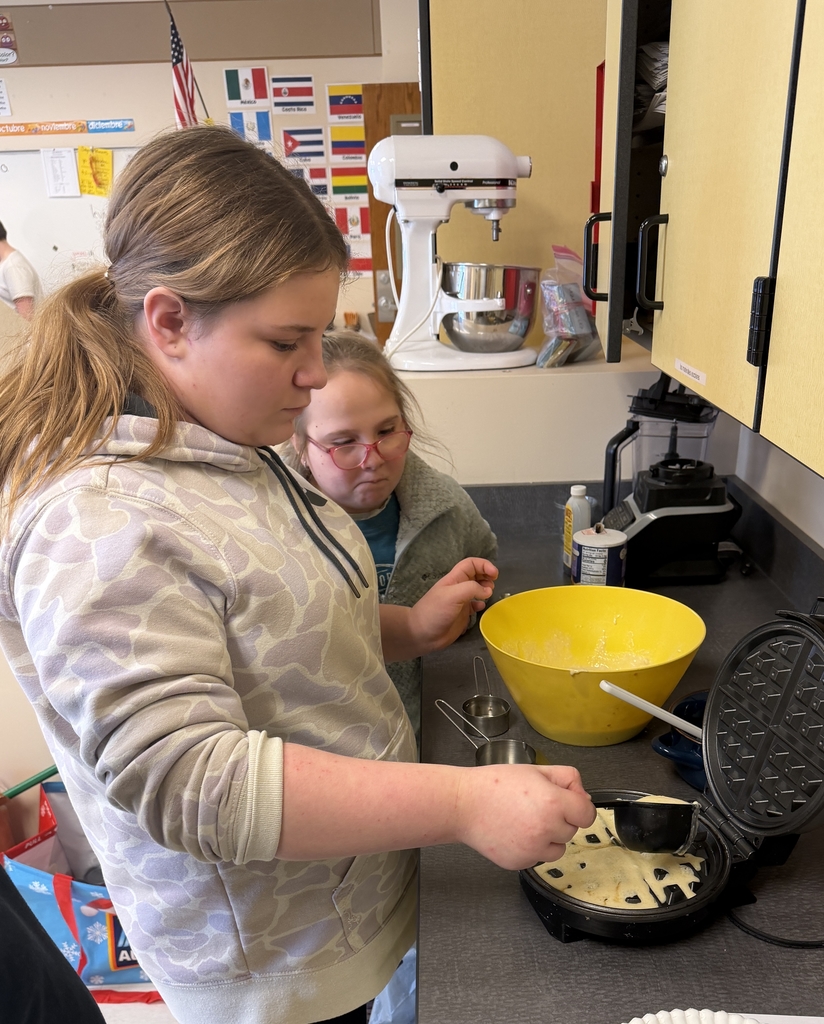 Sixth grade makes waffles