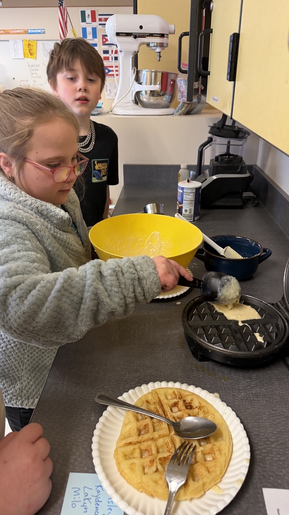Sixth grade makes waffles
