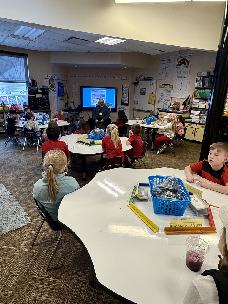 Mr. Foor-Pessin reading to the first grade class
