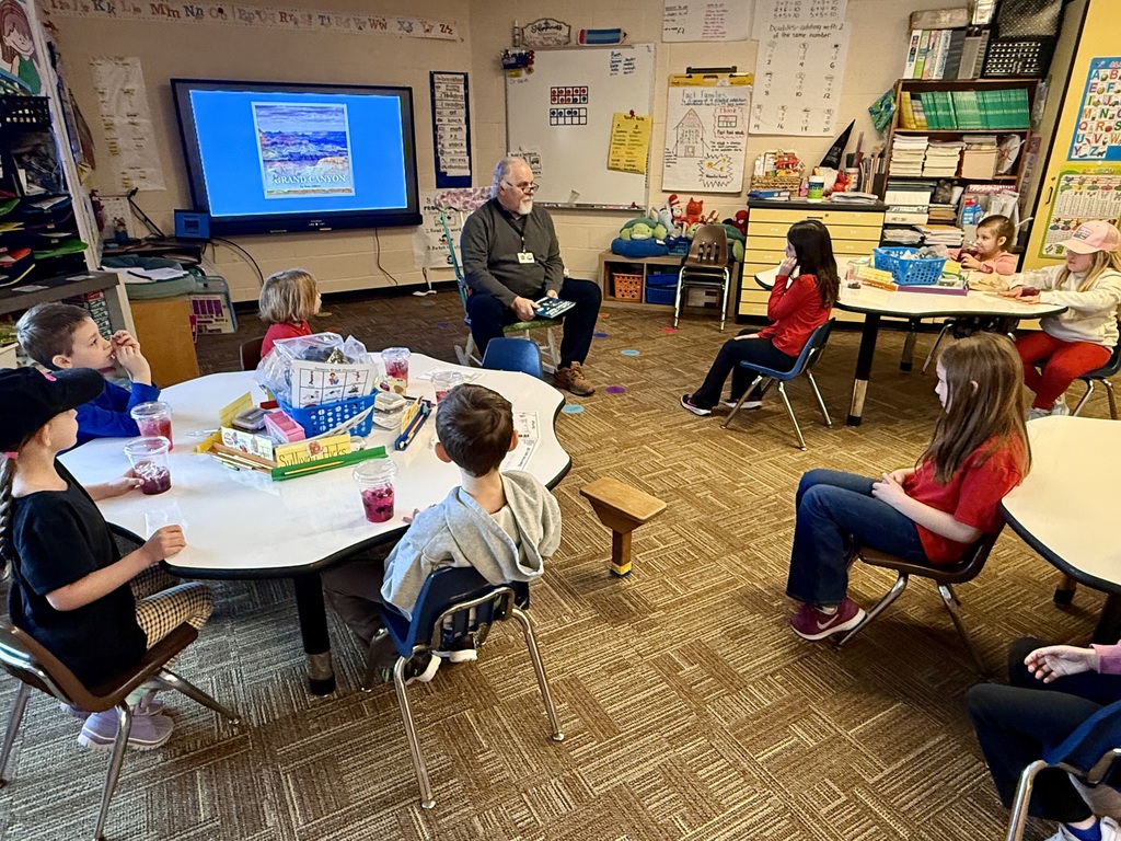 Mr. Foor-Pessin reading to the first grade class