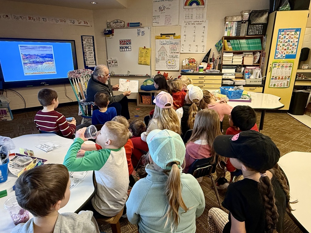 Mr. Foor-Pessin reading to the first grade class