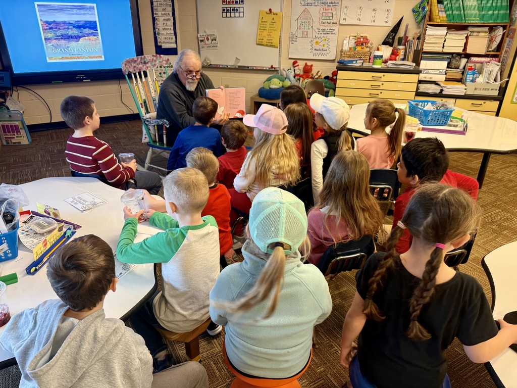 Mr. Foor-Pessin reading to the first grade class