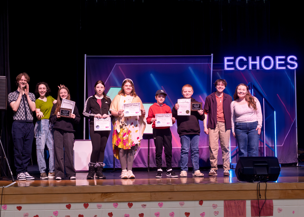 OV winners with the cast and crew on stage