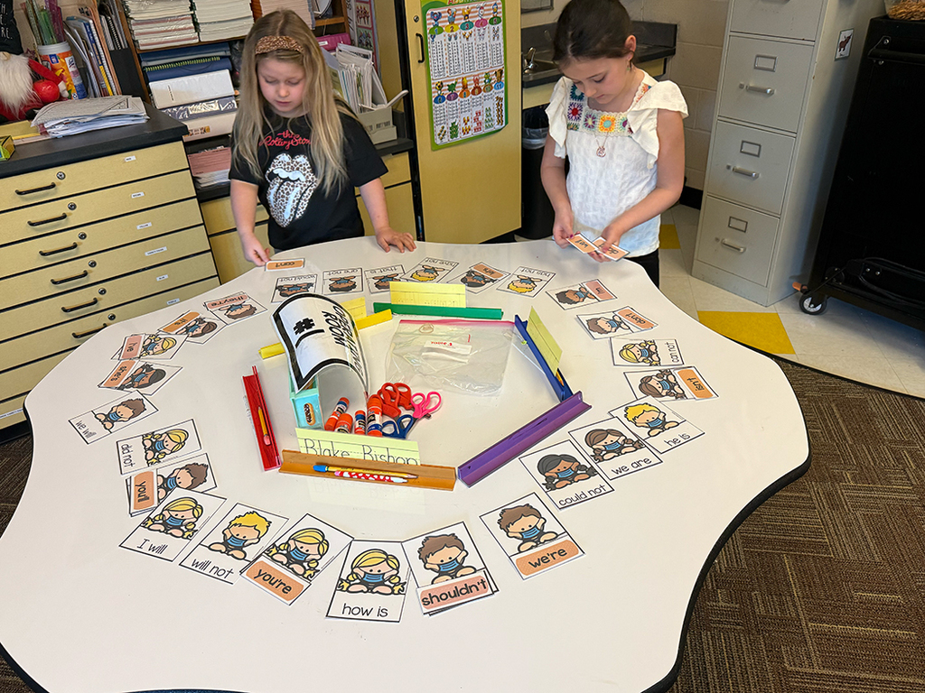 First grade students study the contractions