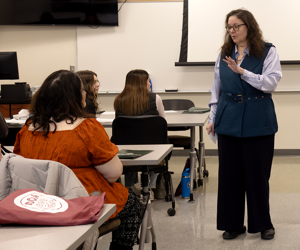 Students hear from a Professor in the classroom