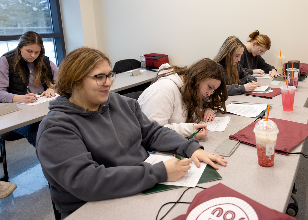Students participate in an activity in the classroom