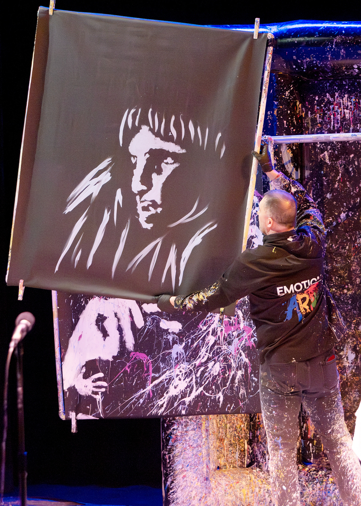 Tom revealing a portrait