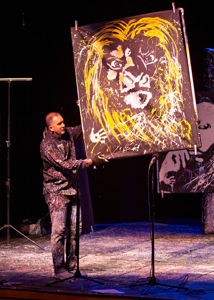 Tom revealing a portrait