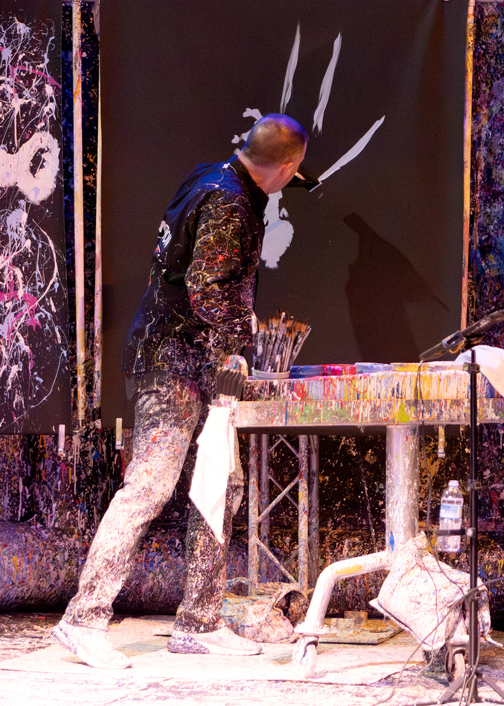 Tom painting a portrait to music