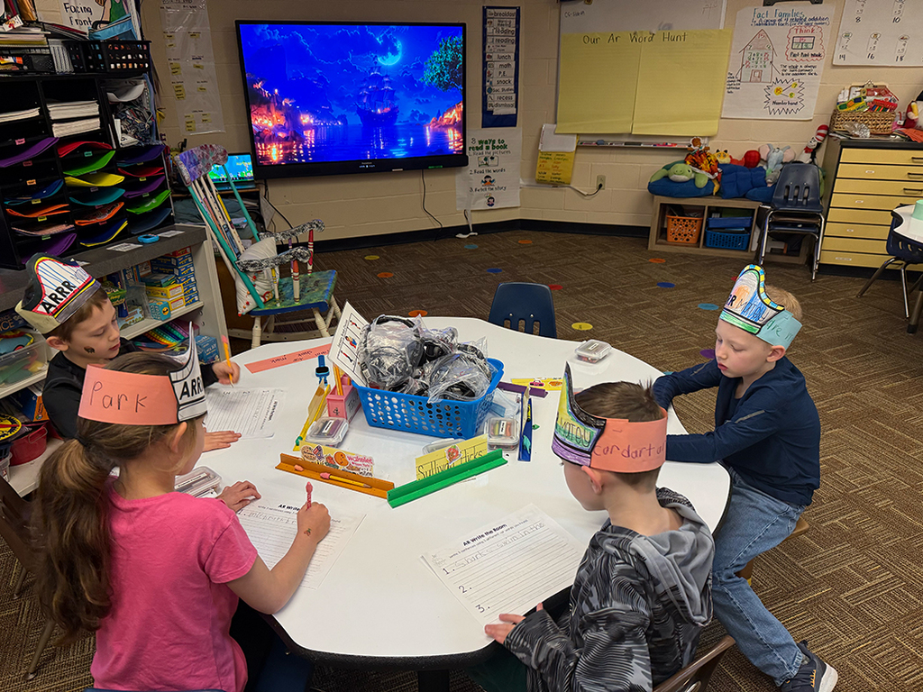 Students writing down their AR words