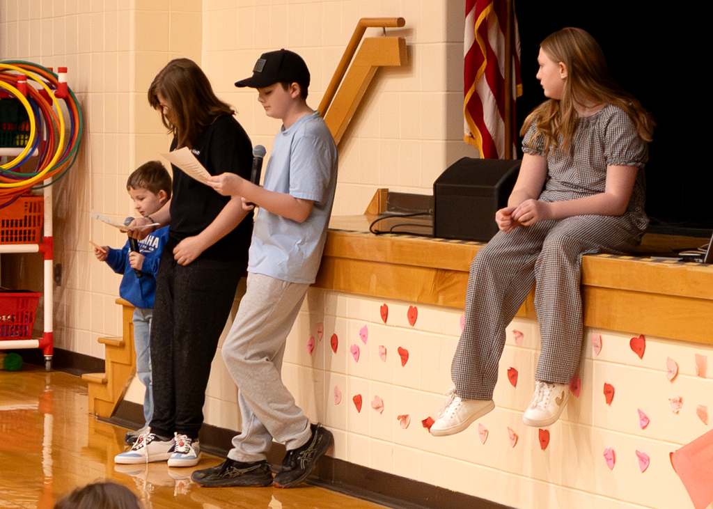 A student shares during morning program