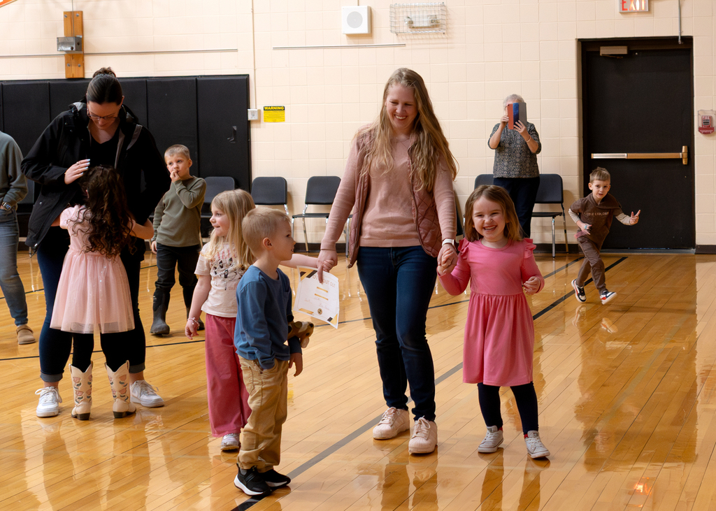 Smiling students and teachers