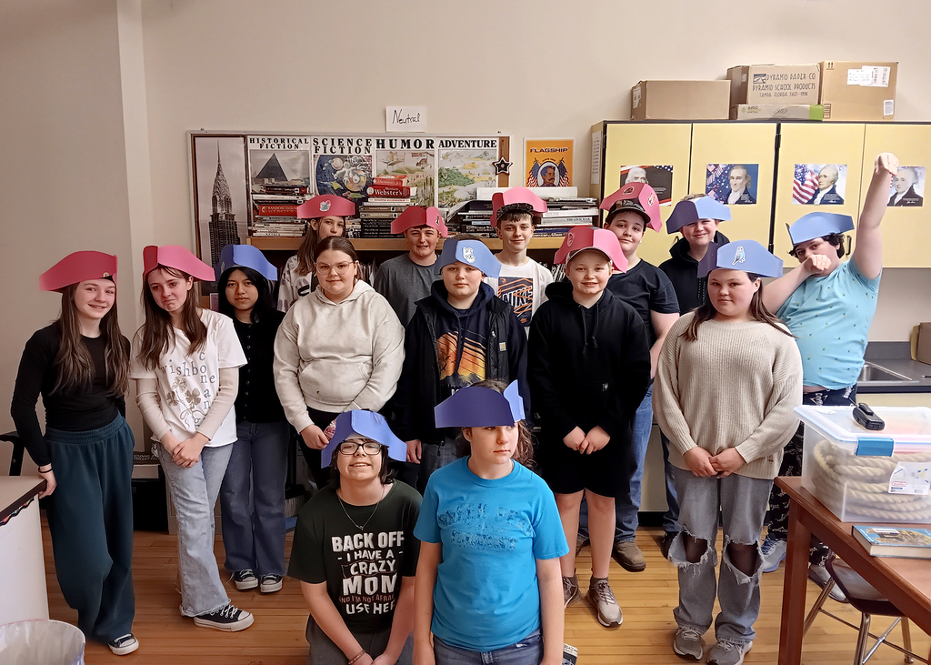 The seventh grade class getting ready for the tug of war