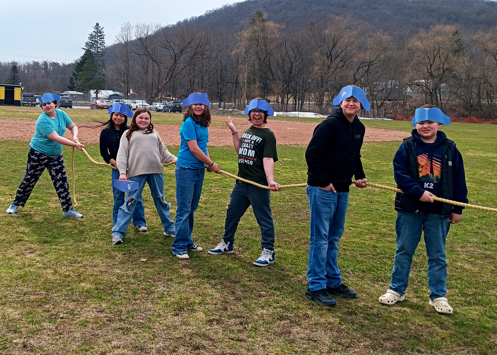 Seventh grade students participate in a tug of war