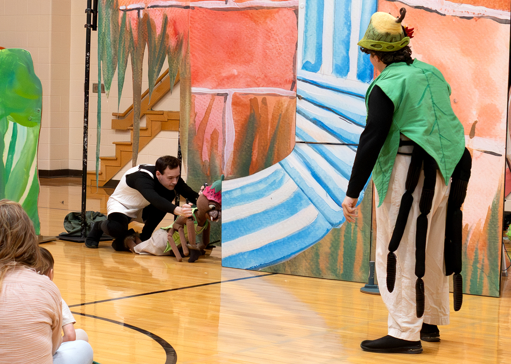 A spider tries climbing the spout