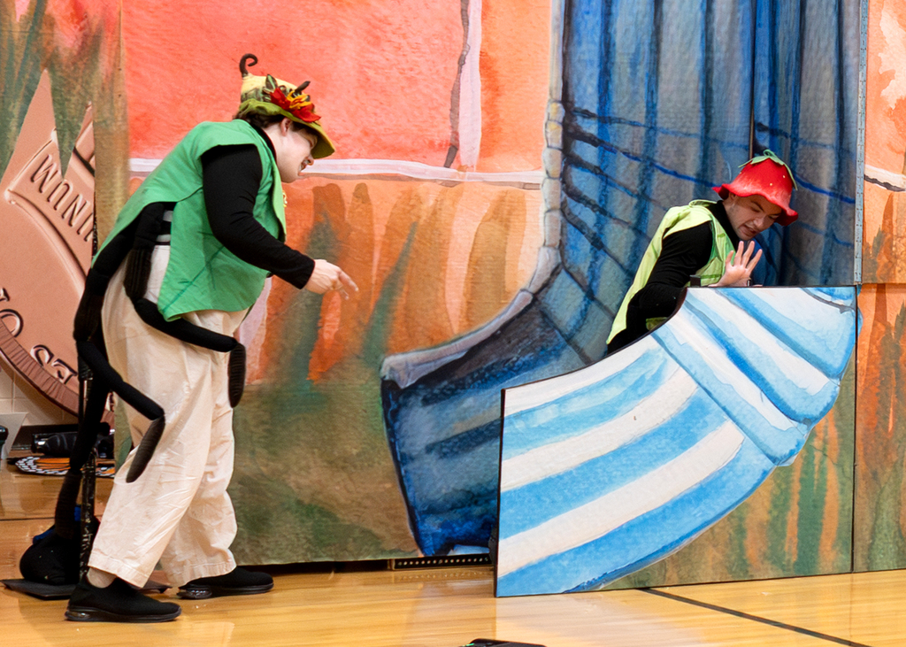 A spider tries to climb the eaves