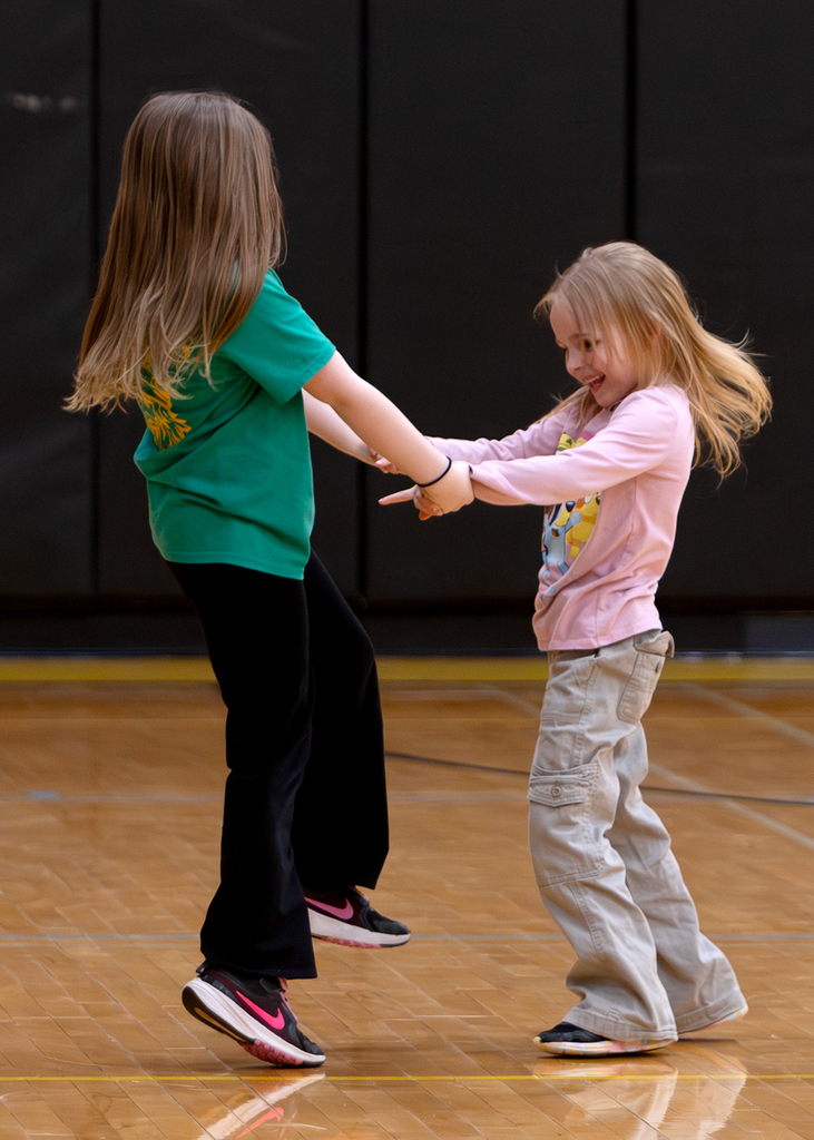 Students dance together