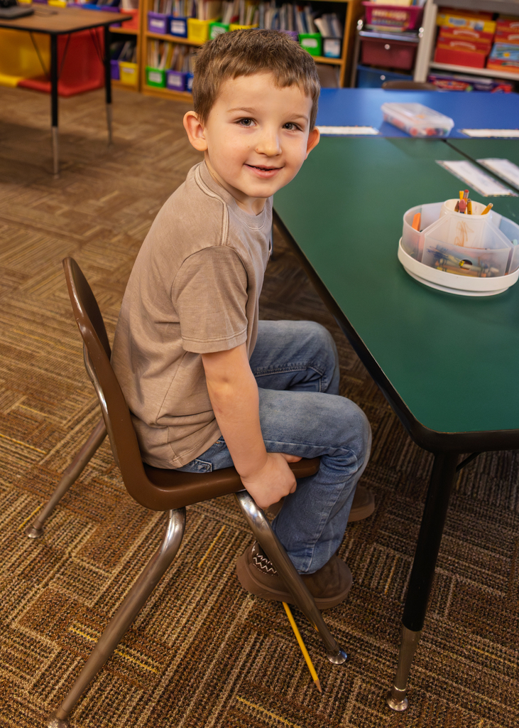 A student keeps his egg warm