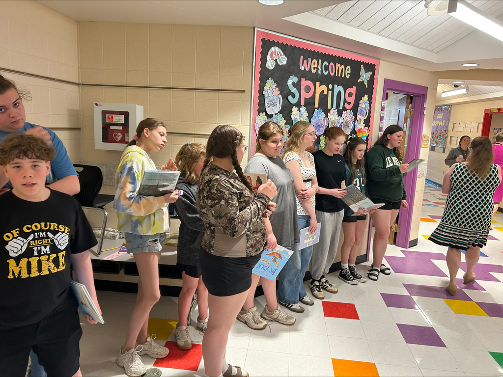 Student actors perform and read books about bravery to elementary students during a classroom visit.