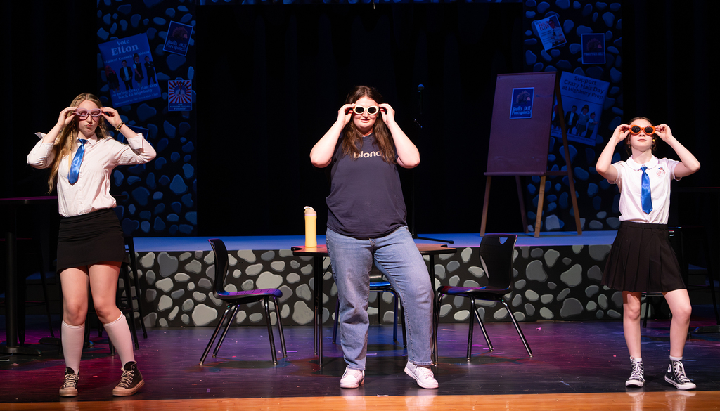 Cast performing Emma on stage